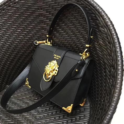 prada lion head bag dupe|prada triangle bag dupes.